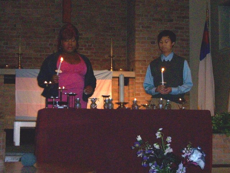 100_0201.JPG - Tia Williams and Michael Yeh, lighting memorial candles