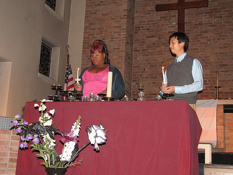 IMG_4385.JPG - Tia Williams and Michael Yeh, lighting memorial candles