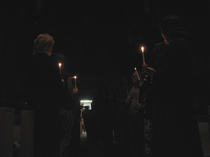 IMG_4488.JPG - Participants pledge to never let the light of those individuals who have died in anti-transgender violence go out, as they pass on the symbolic flame